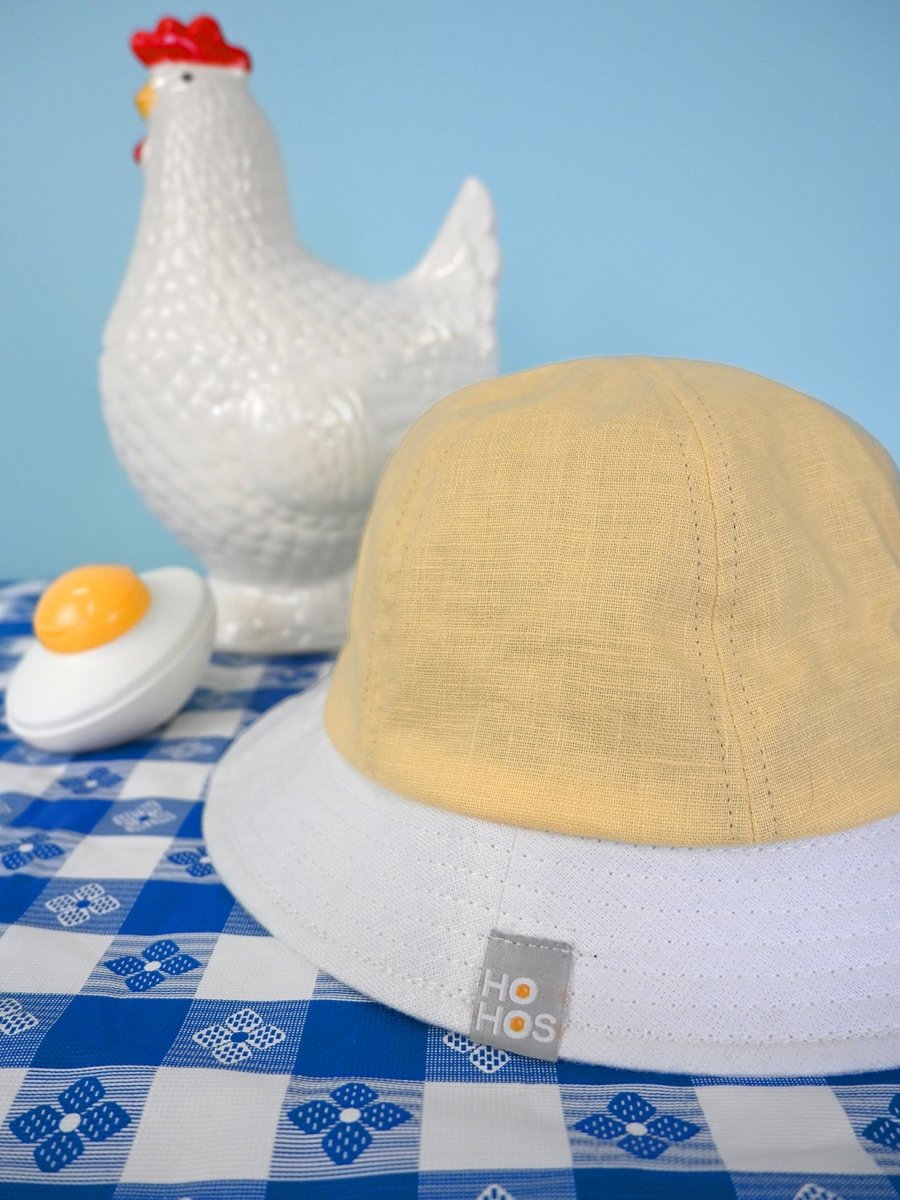 "Egghead" Linen bucket hat. Design by HO HOS HOLE IN THE WALL 🐜 Made in NYC